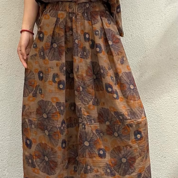 Eleganter Rock mit Blumenmuster und Taschen